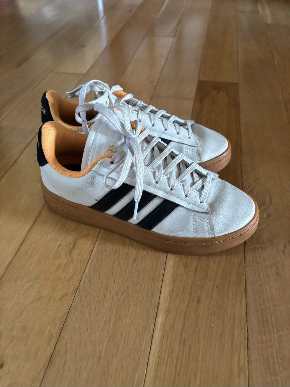 adidas women’s White Sneakers with Black Stripes and Gum Sole